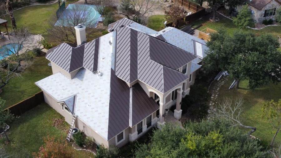 Bronze standing seam going on over new underlayment